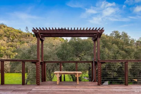 a view of a deck with a ocean view