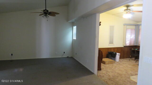 3750 Brocket Ranch Road Rimrock, AZ 86335 - Photo 18 of 48 an empty room with a window and a fireplace