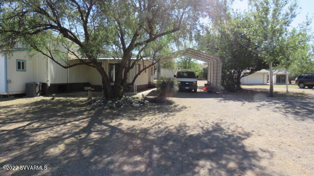 3750 Brocket Ranch Road Rimrock, AZ 86335 - Photo 8 of 48 a view of a house with a yard