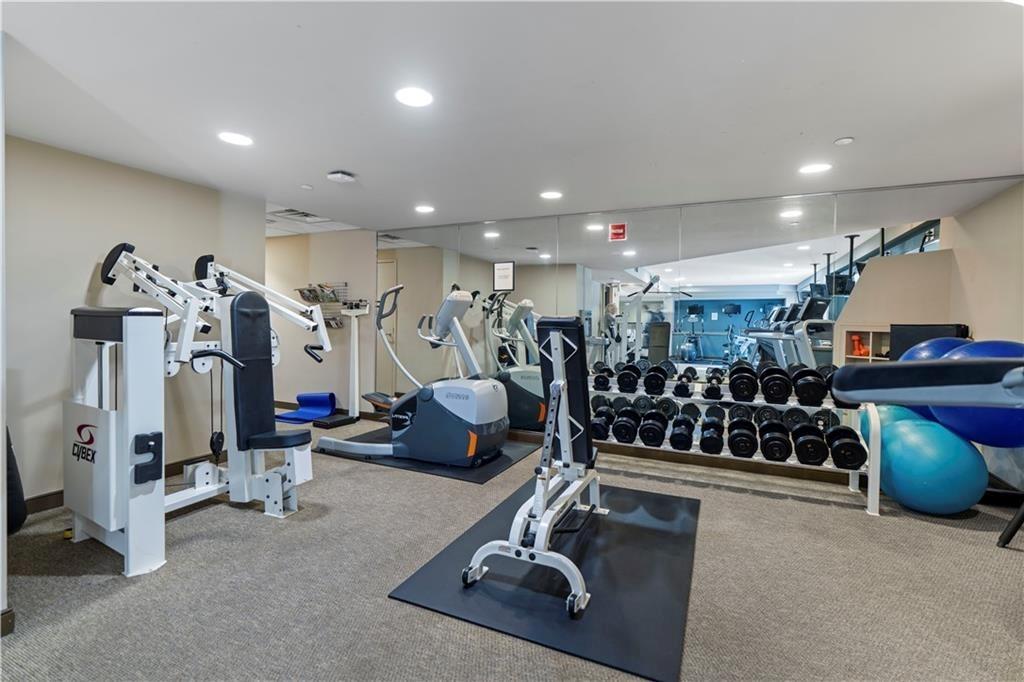 2626 Peachtree Road Northwest, Unit 704 Atlanta, GA 30305 - Photo 16 of 23 a view of a room with gym equipment