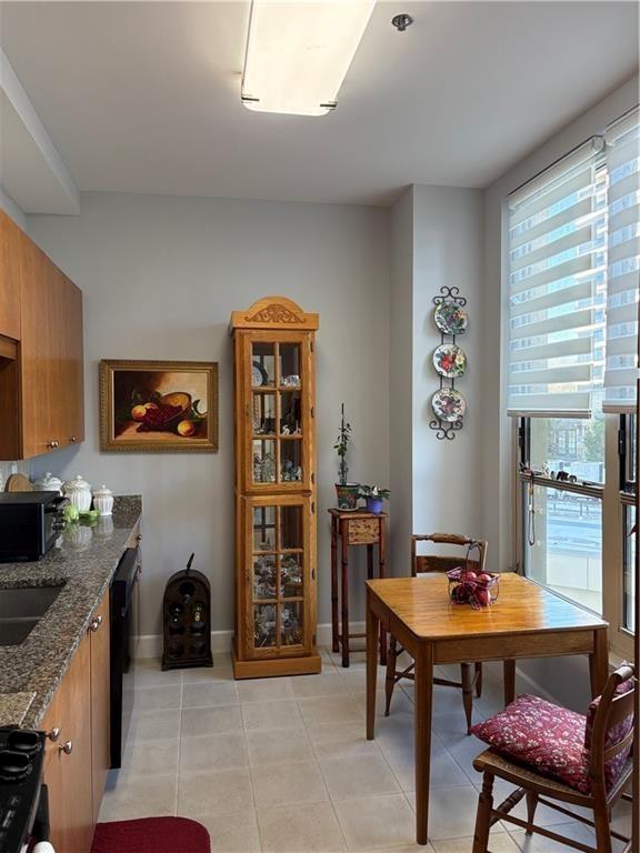 2626 Peachtree Road Northwest, Unit 704 Atlanta, GA 30305 - Photo 6 of 23 a view of a livingroom with furniture and window