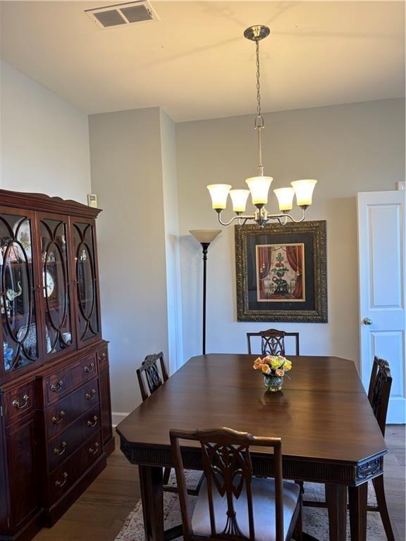 2626 Peachtree Road Northwest, Unit 704 Atlanta, GA 30305 - Photo 8 of 23 a view of a dining room with furniture