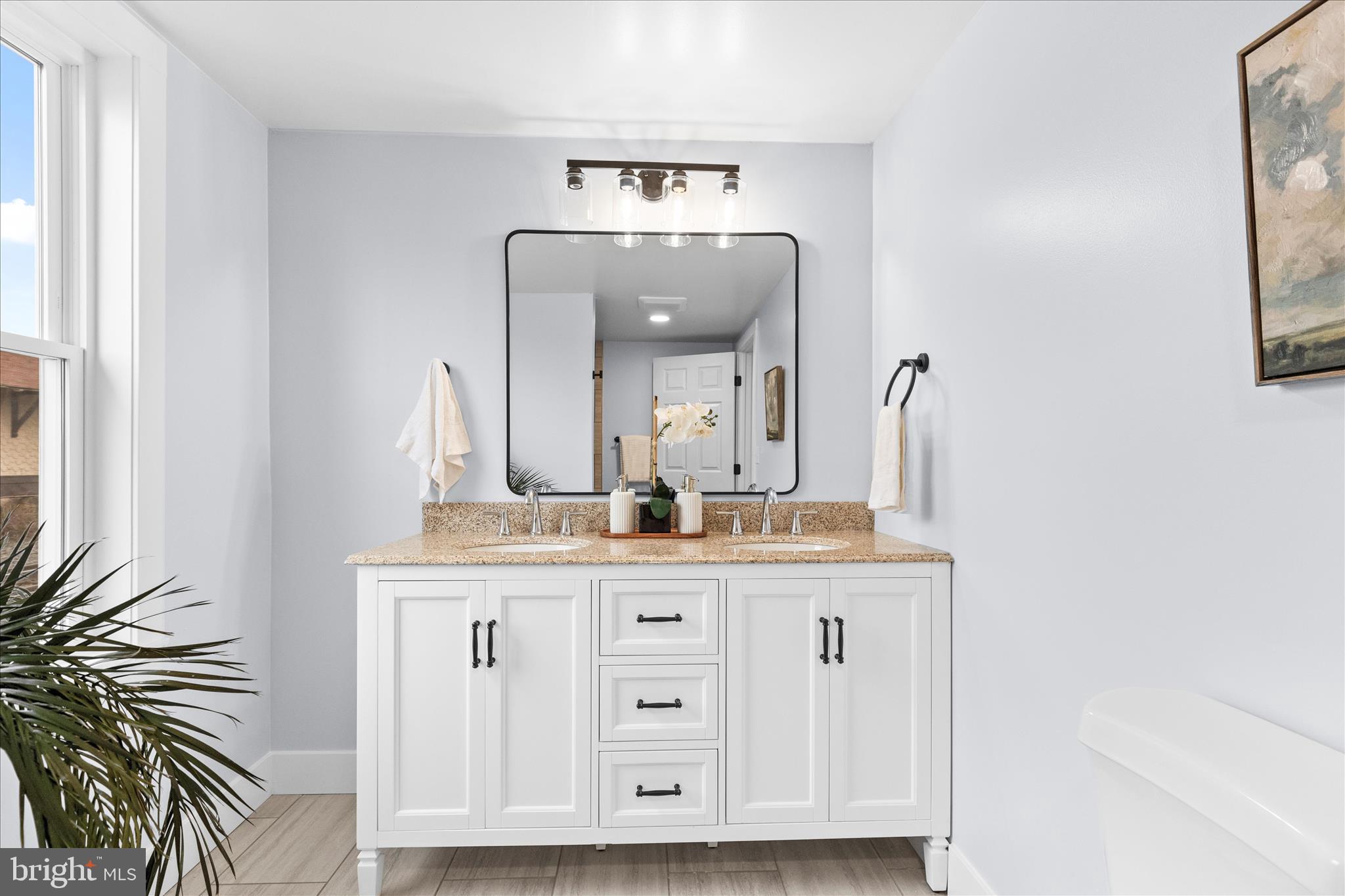 21 Upper Bermudian Road Gardners, PA 17324 - Photo 25 of 40 a bathroom with a granite countertop double vanity sink and a mirror