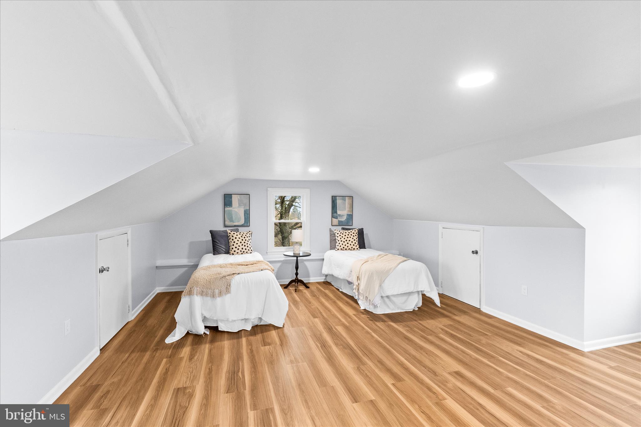 21 Upper Bermudian Road Gardners, PA 17324 - Photo 30 of 40 a spacious bedroom with two beds lamp and a potted plant