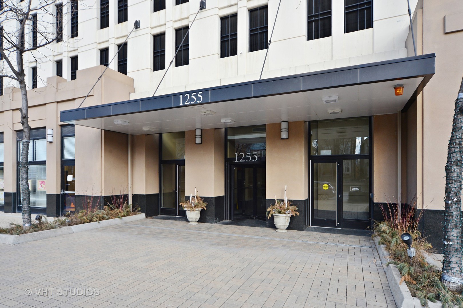 1255 South State Street, Unit 1406 Chicago, IL 60605 - Photo 9 of 9 a view of a building with glass door