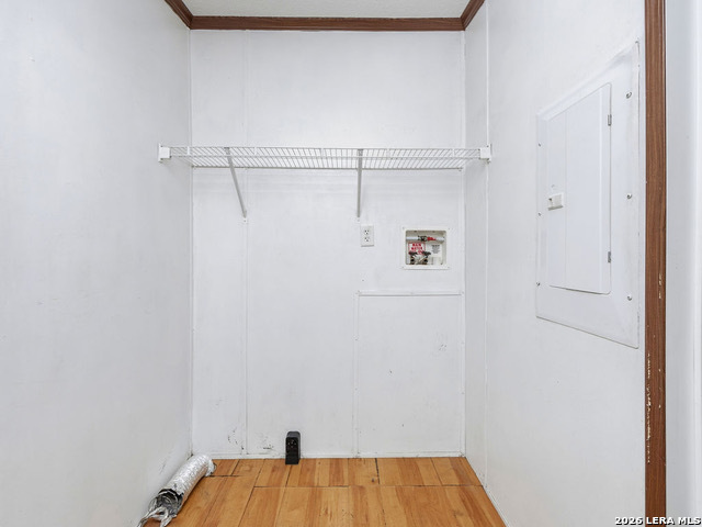 135 Savannah Ridge Von Ormy, TX 78073 - Photo 22 of 45 a view of a room with racks on the wall