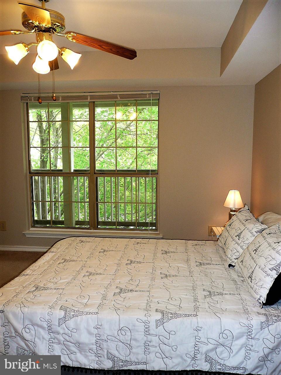 3903 Penderview Drive, Unit 1535 Fairfax, VA 22033 - Photo 14 of 36 a bedroom with a bed and a window