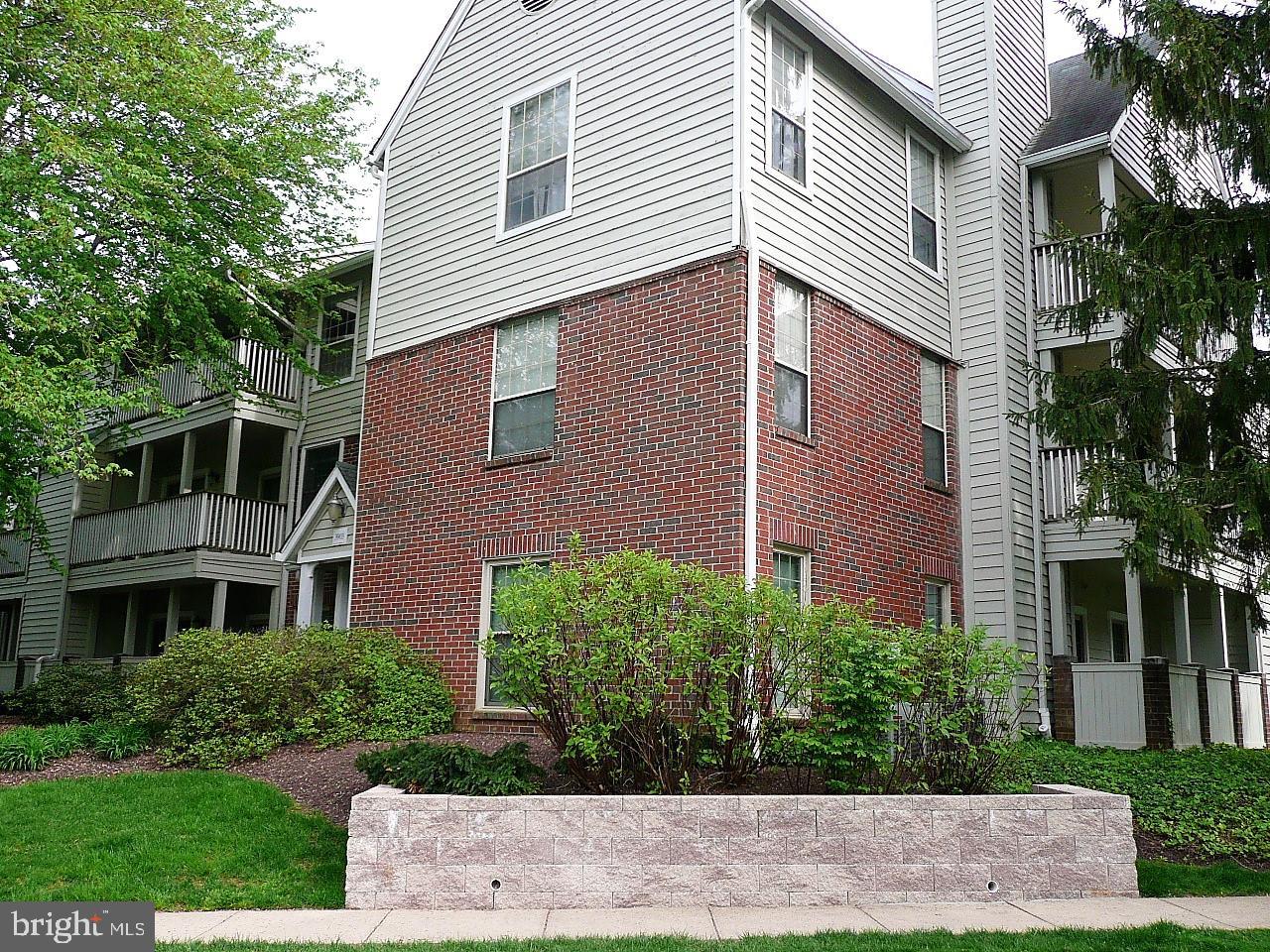 3903 Penderview Drive, Unit 1535 Fairfax, VA 22033 - Photo 2 of 36 a view of a building with a yard