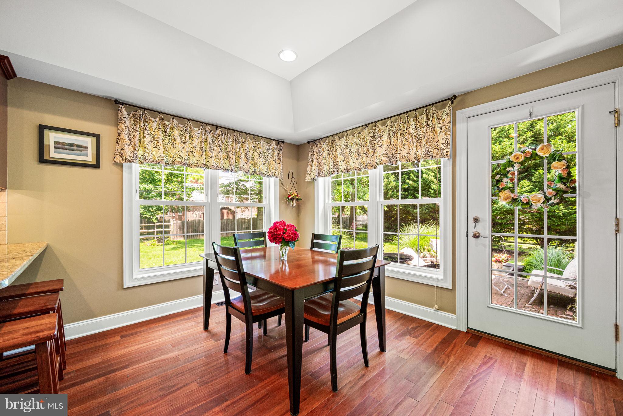 107 Lombardy Drive Wallingford, PA 19086 - Photo 13 of 36 a dining room with furniture window wooden floor
