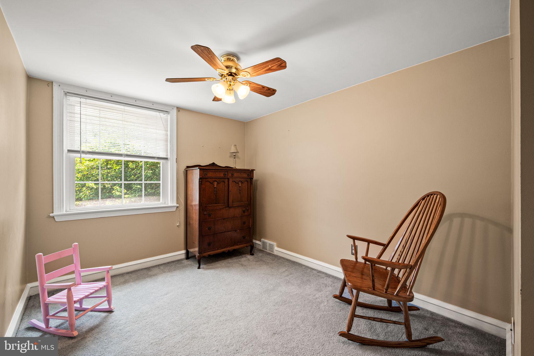 107 Lombardy Drive Wallingford, PA 19086 - Photo 22 of 36 a view of a workspace with furniture and a window