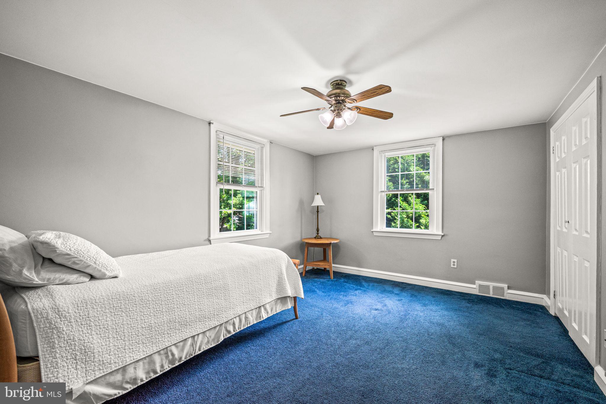 107 Lombardy Drive Wallingford, PA 19086 - Photo 26 of 36 a bedroom with a bed and a window