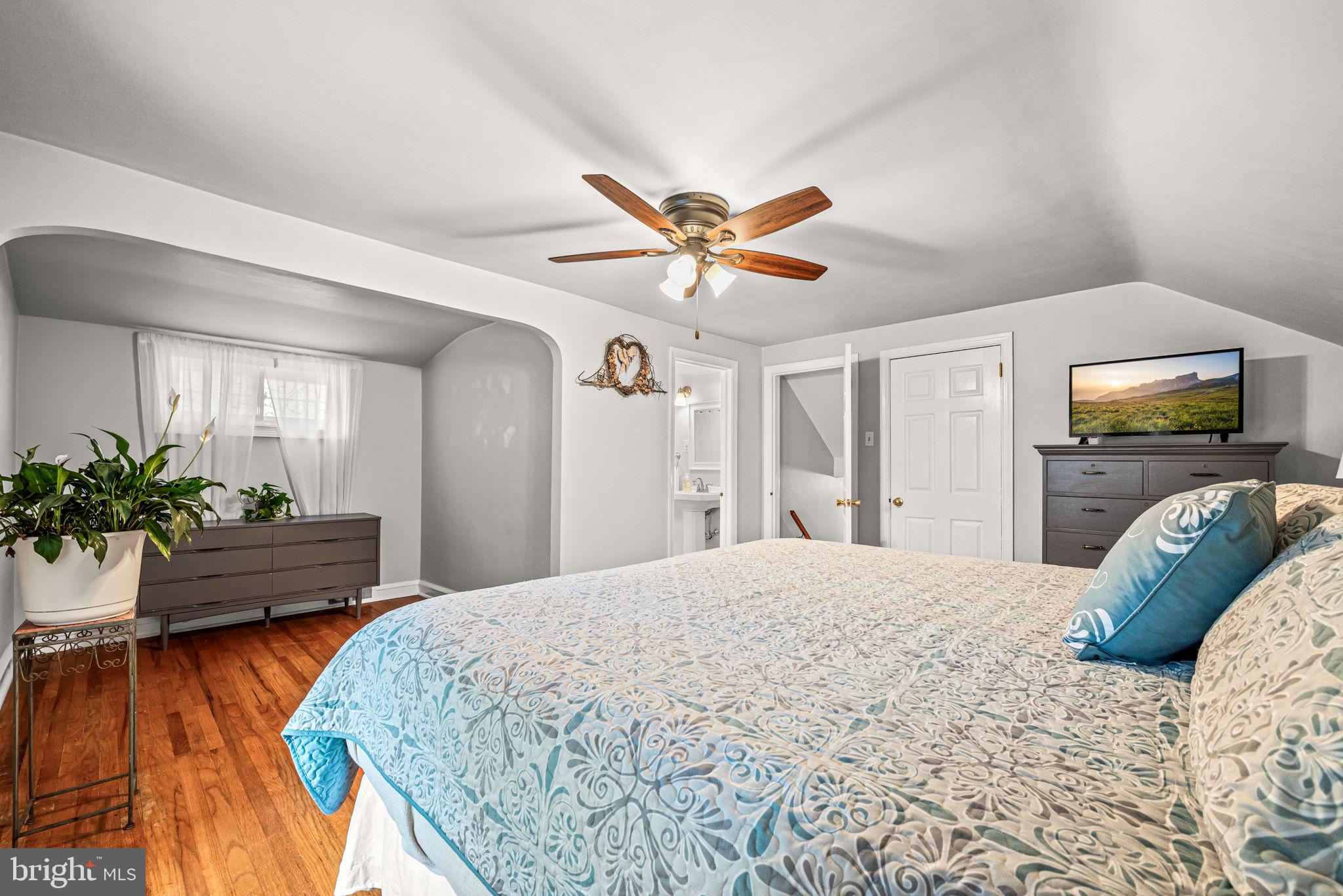 107 Lombardy Drive Wallingford, PA 19086 - Photo 28 of 36 a bedroom with a bed and a couch