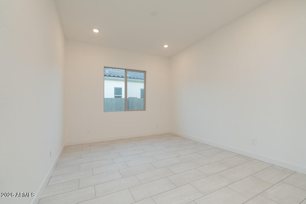 2260 Foremaster Road San Tan Valley, AZ 85140 - Photo 8 of 16 an empty room with a window