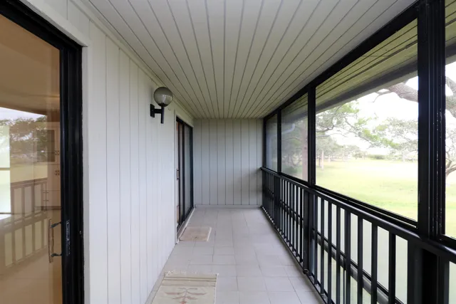 a kitchen with a stove a refrigerator and a sink