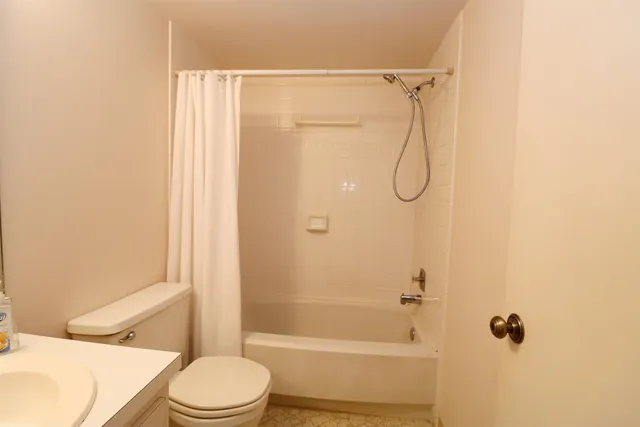 an empty room with closet area