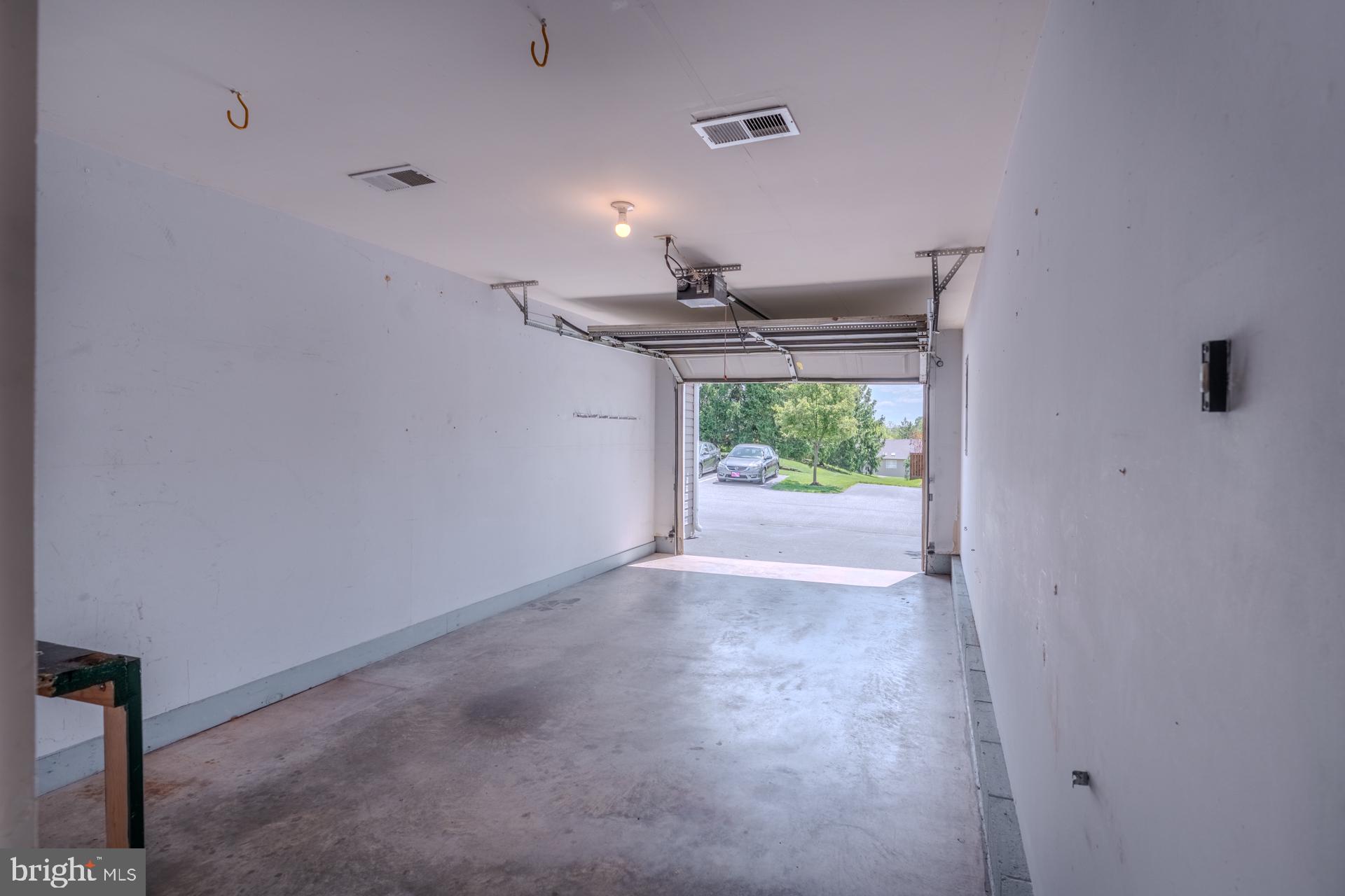 305 Stonegate Road York, PA 17408 - Photo 34 of 38 Spacious garage with inviting access.
