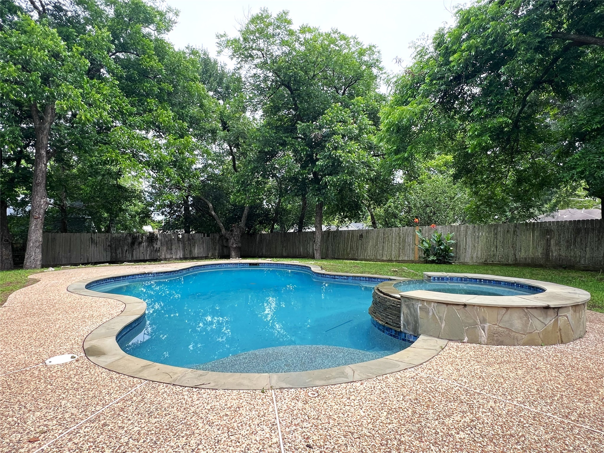 606 Sycamore Street Brenham, TX 77833 - Photo 24 of 27 a view of a swimming pool with a patio