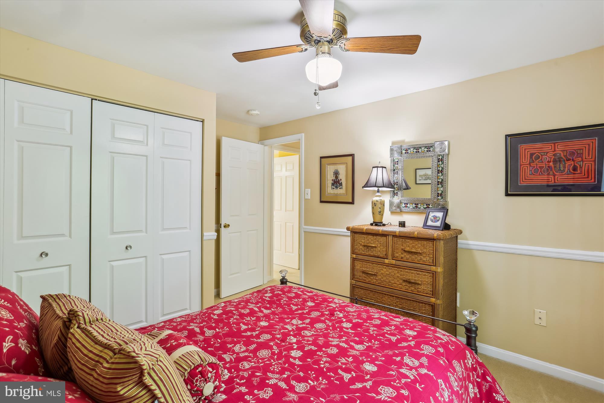 207 Rabbitt Road Gaithersburg, MD 20878 - Photo 25 of 38 a bedroom with a bed and a dresser in it