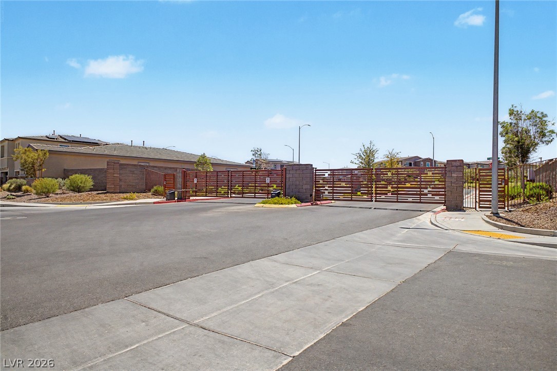 226 Augusta Ridge Henderson, NV 89015 - Photo 33 of 47 Secure community entrance with an inviting and organized approach.