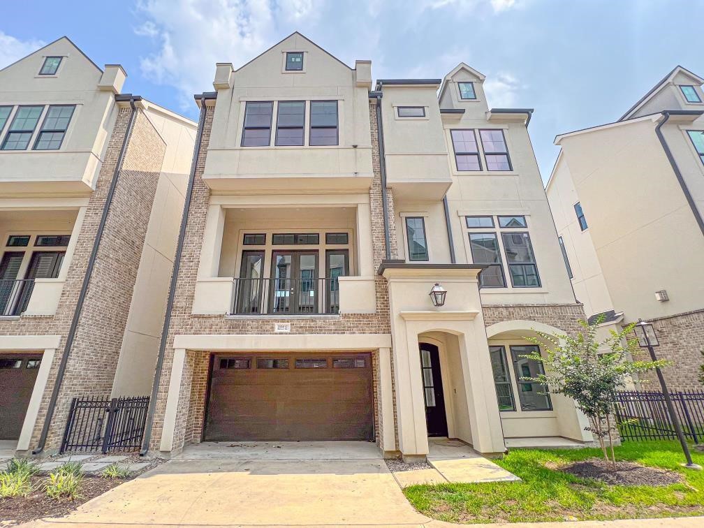 2122 Blalock Road, Unit C Houston, TX 77080 - Photo 1 of 45 a front view of a residential houses with yard