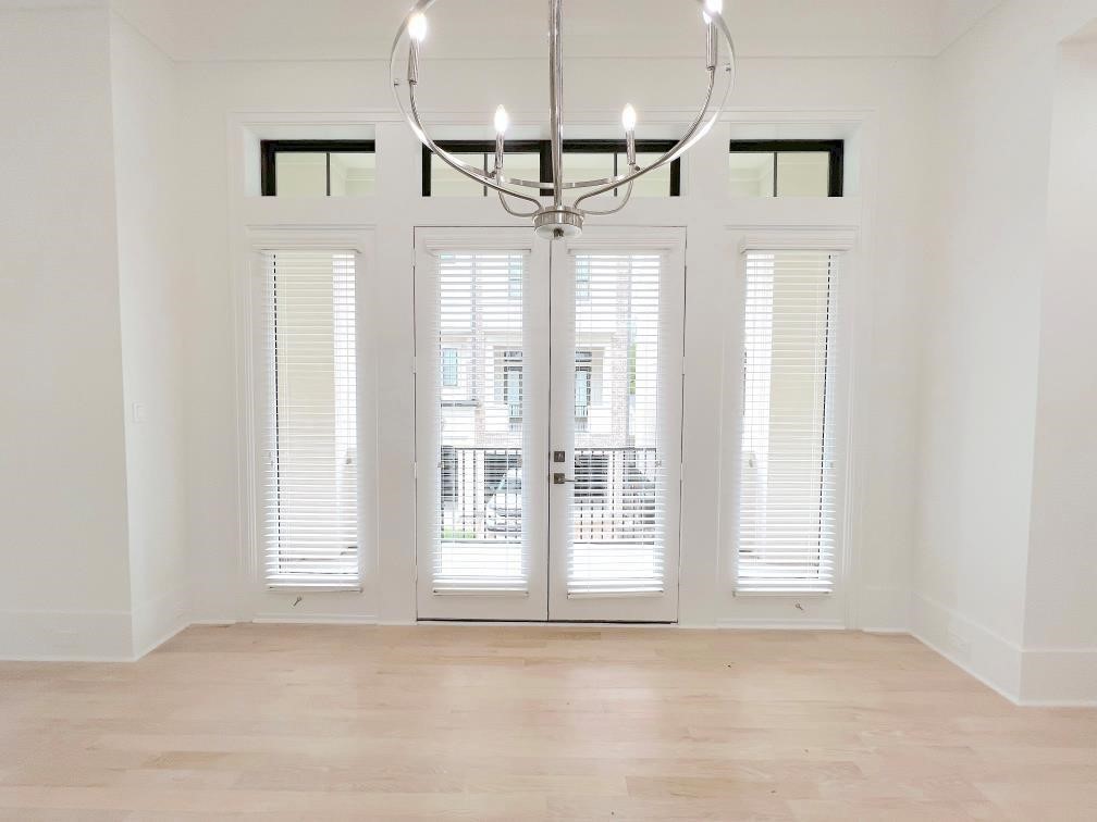 2122 Blalock Road, Unit C Houston, TX 77080 - Photo 11 of 45 a view of entryway and kitchen with a ceiling fan