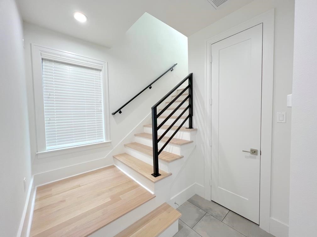 2122 Blalock Road, Unit C Houston, TX 77080 - Photo 12 of 45 a view of an entryway with staircase