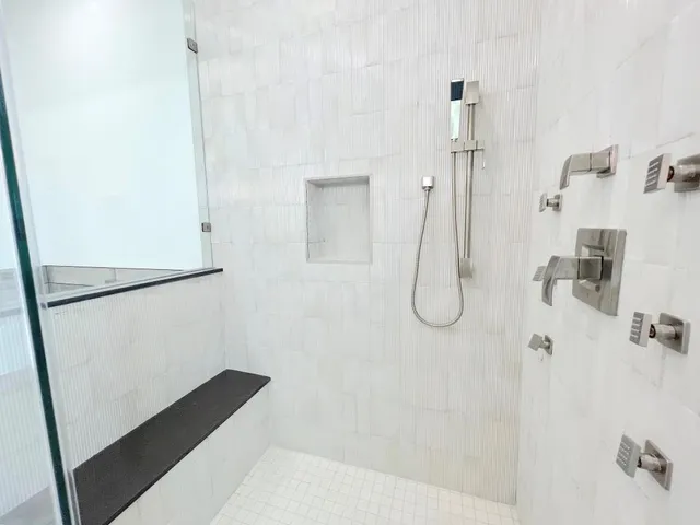 a bathroom with a bath tub