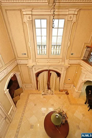 a view of a couch in front of a window