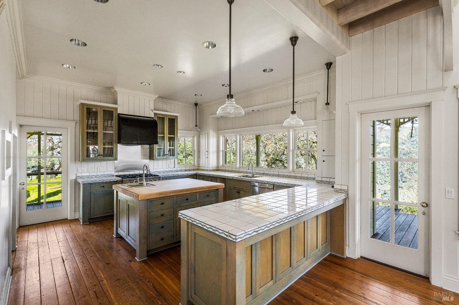 13700 Rockpile Road Geyserville, CA 95441 - Photo 42 of 64 a kitchen with a stove and a wooden floor