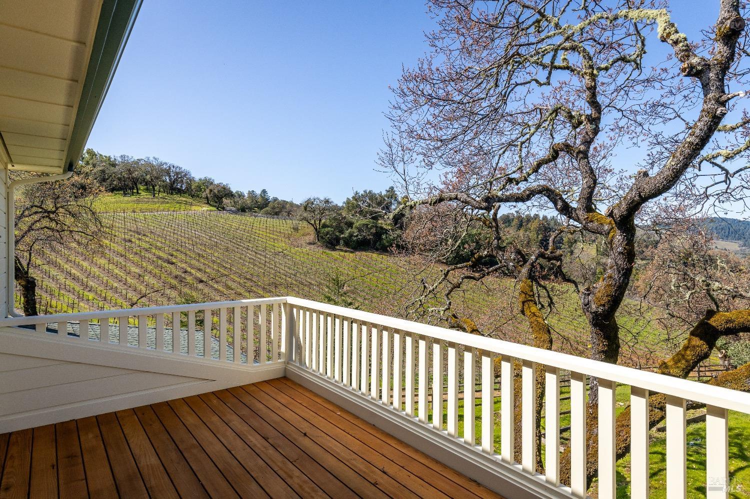 13700 Rockpile Road Geyserville, CA 95441 - Photo 51 of 64 a view of balcony with wooden floor and lake view