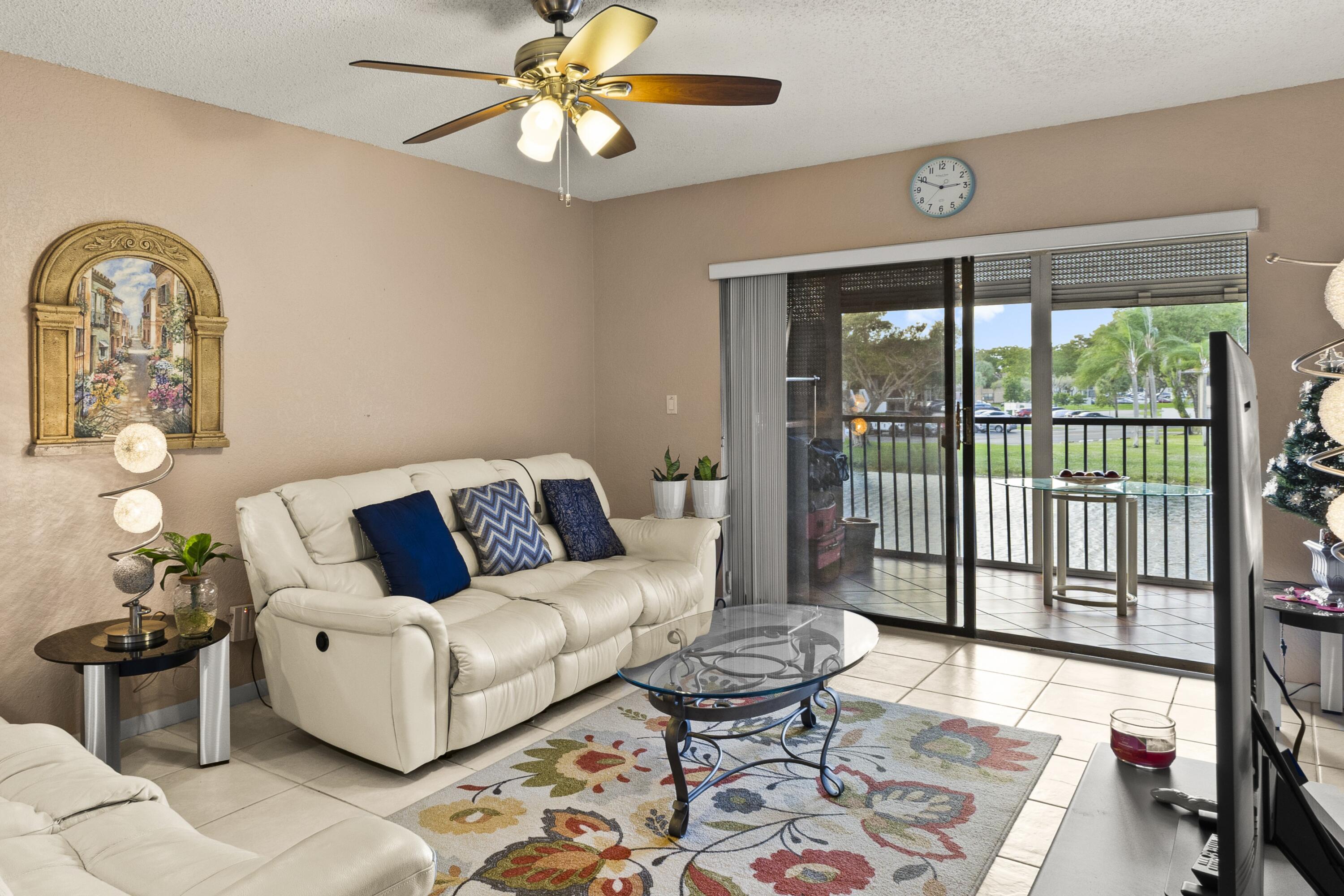 9563 West McNab Road, Unit 206 Tamarac, FL 33321 - Photo 2 of 18 living room2
