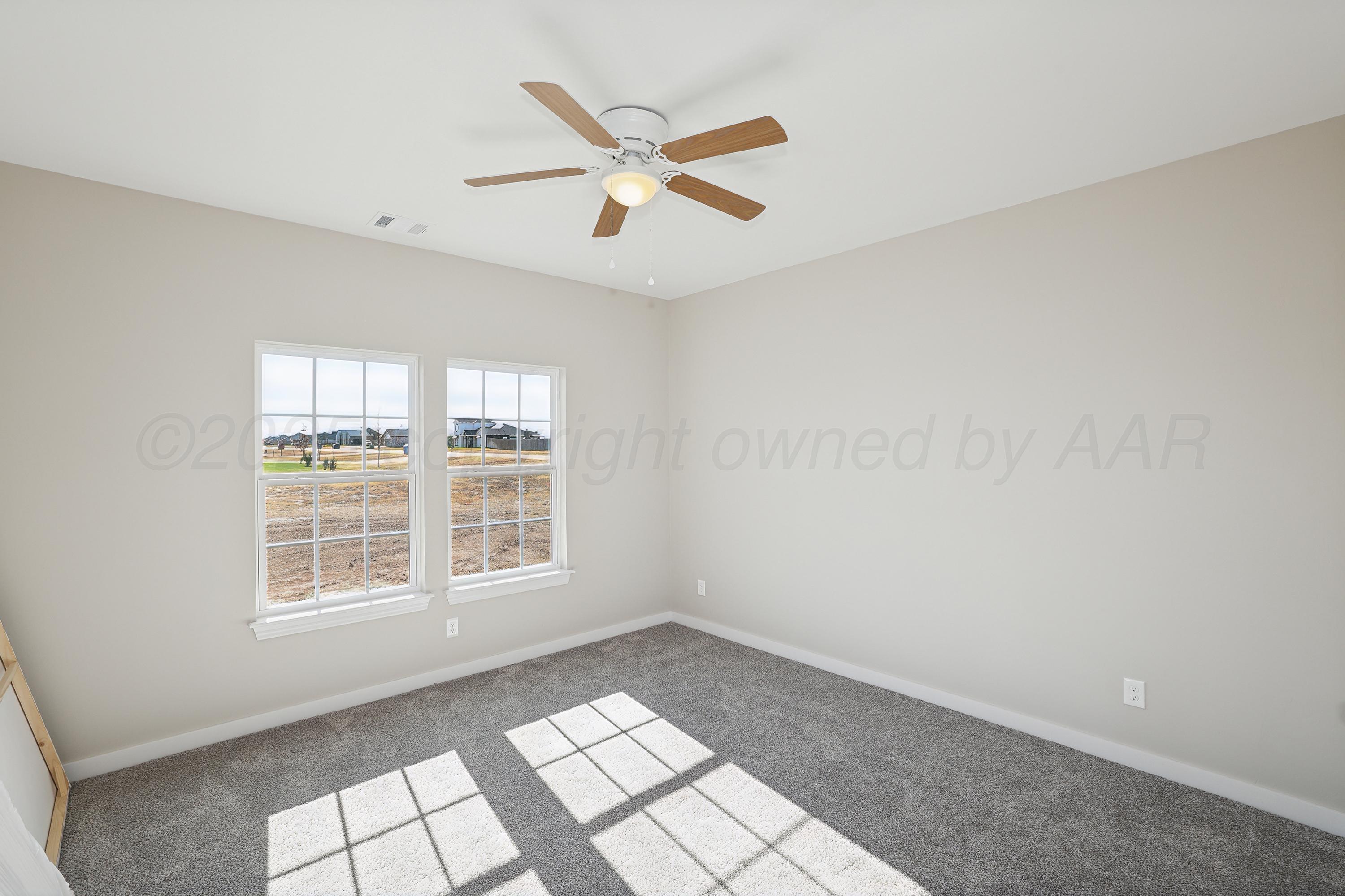10250 Piper Lane Amarillo, TX 79119 - Photo 14 of 21 a view of an empty room with a window