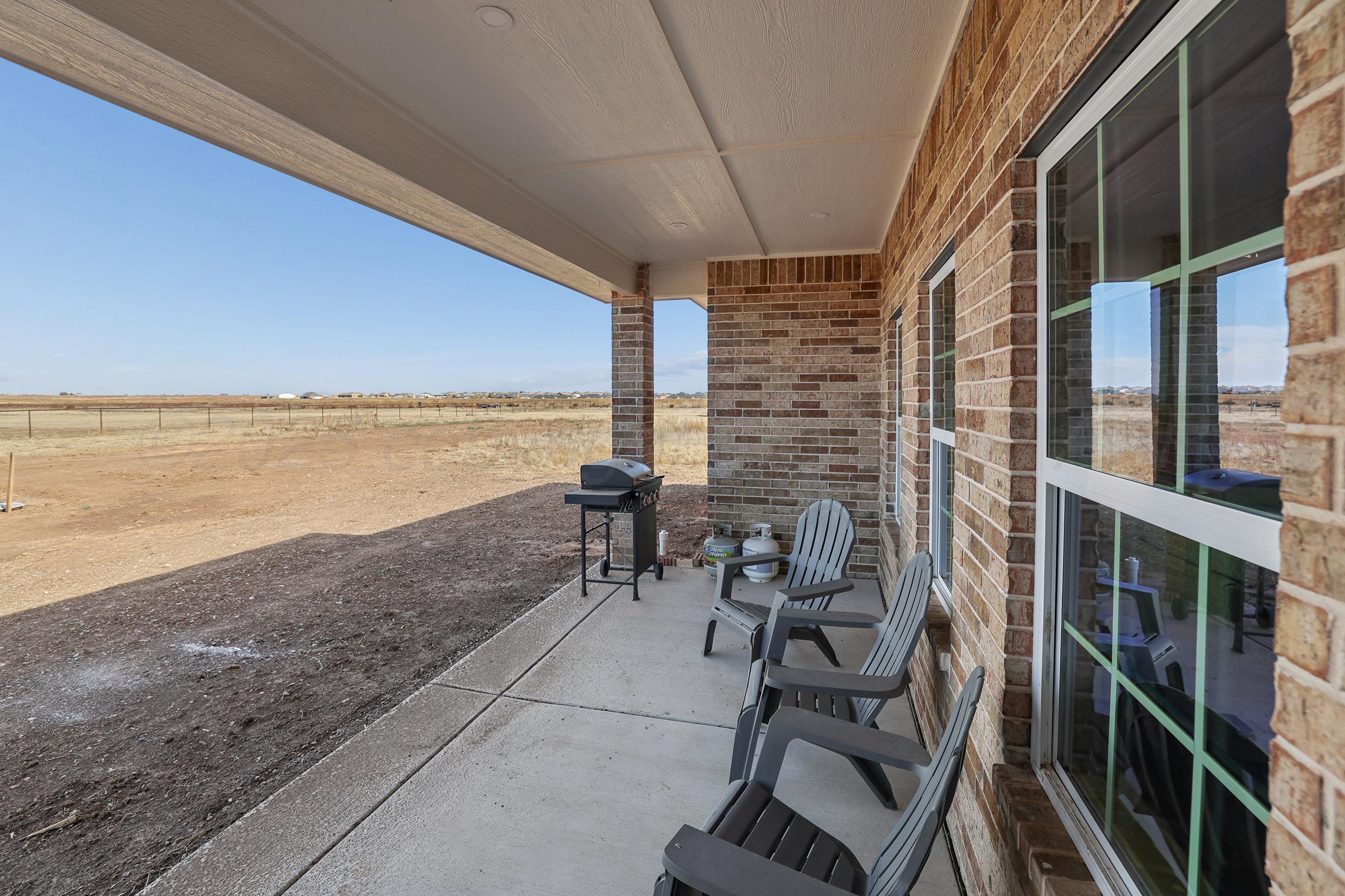 10250 Piper Lane Amarillo, TX 79119 - Photo 19 of 21 a view of a balcony with chairs