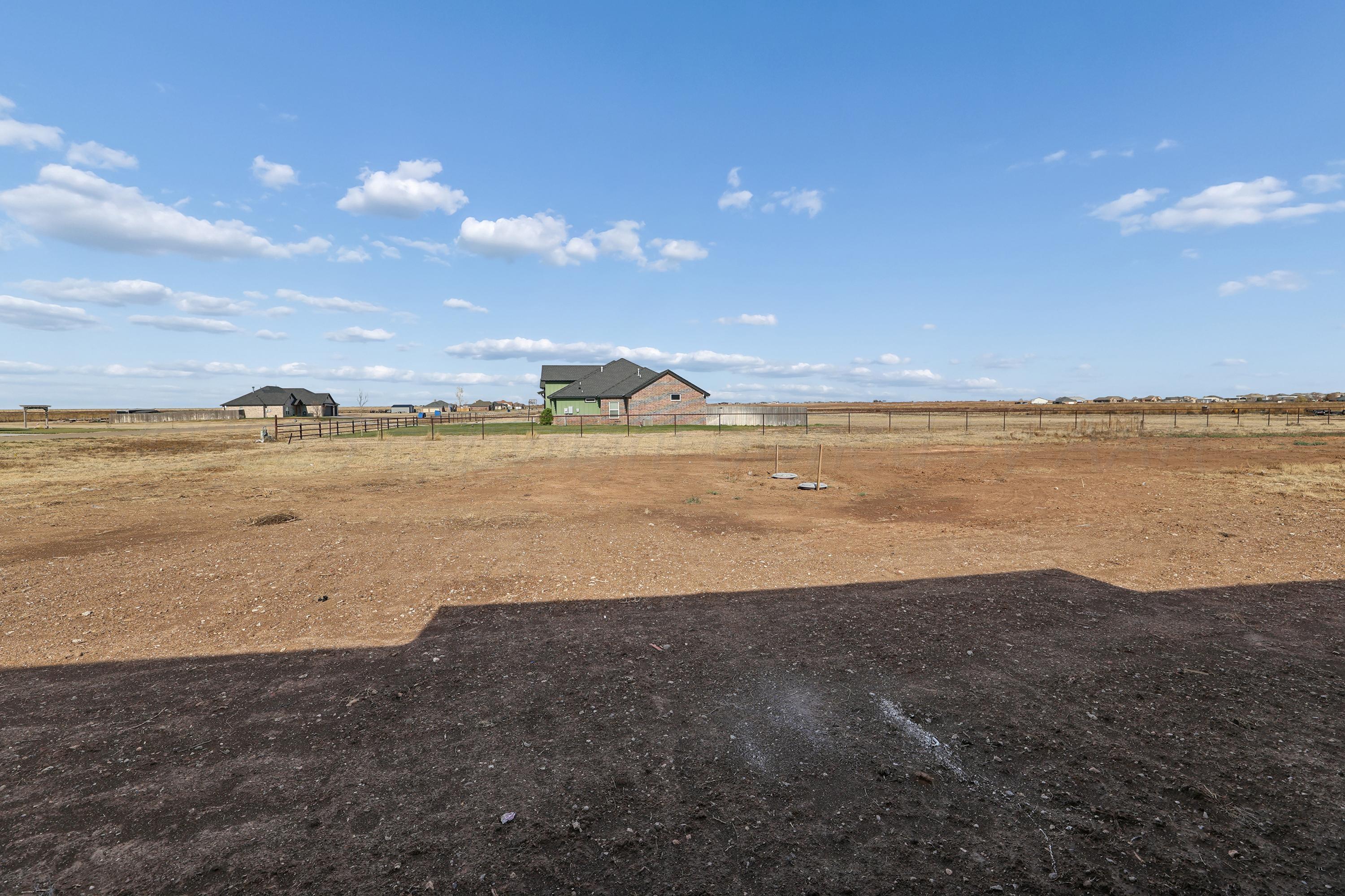 10250 Piper Lane Amarillo, TX 79119 - Photo 20 of 21 a view of an ocean and beach