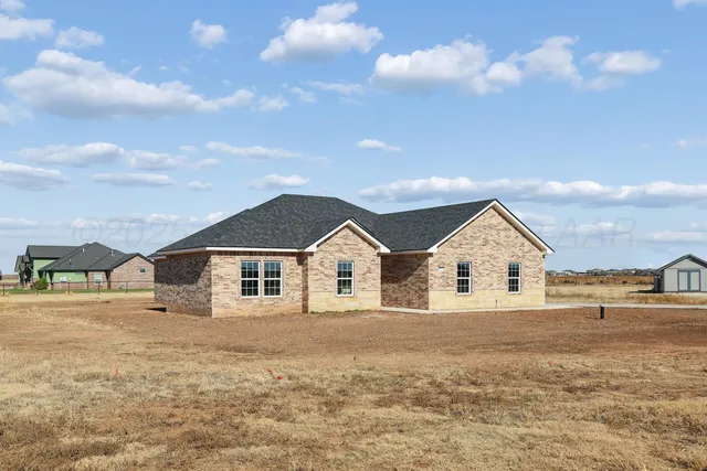a view of house with outdoor space