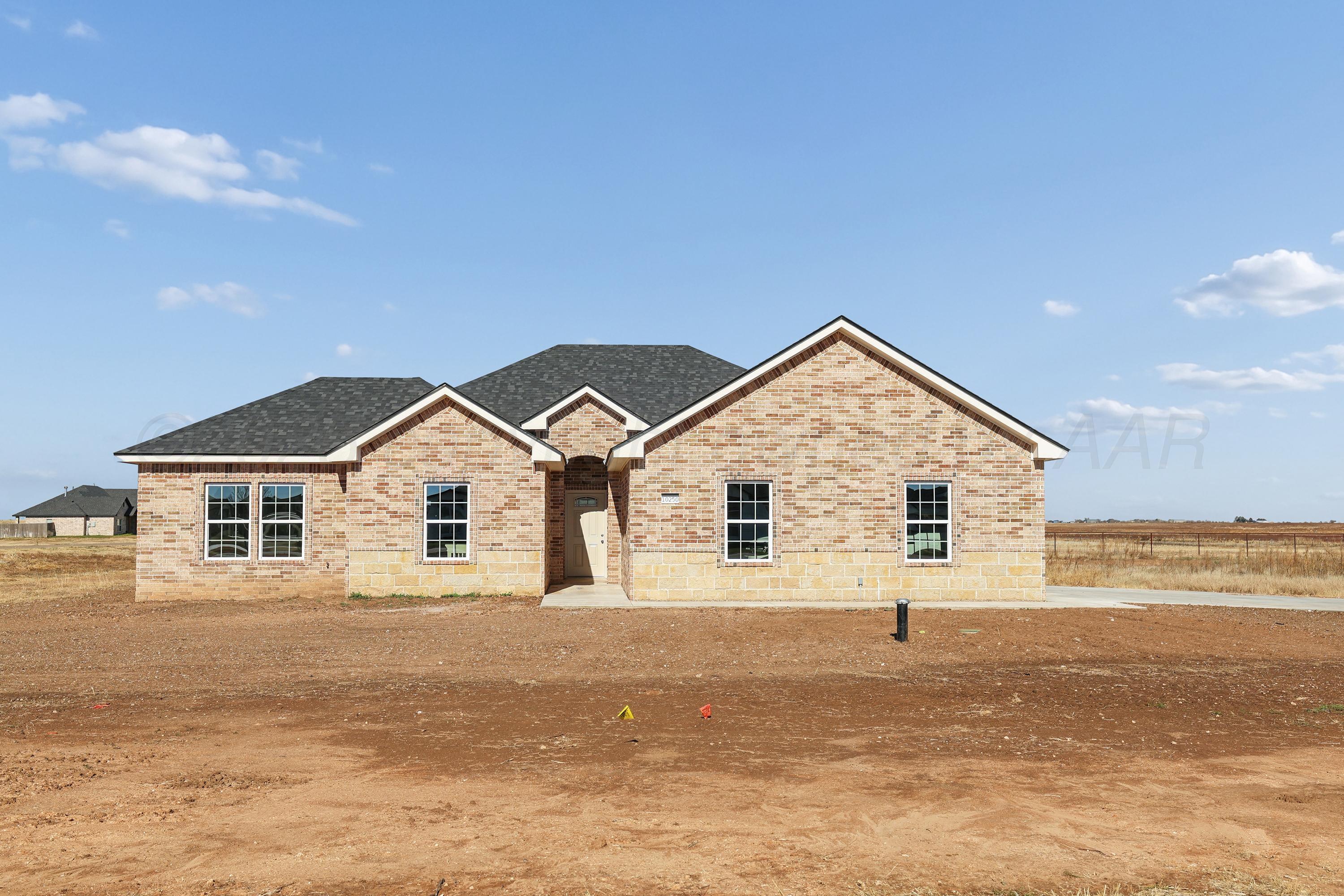 10250 Piper Lane Amarillo, TX 79119 - Photo 3 of 21 a view of a house with a ocean view