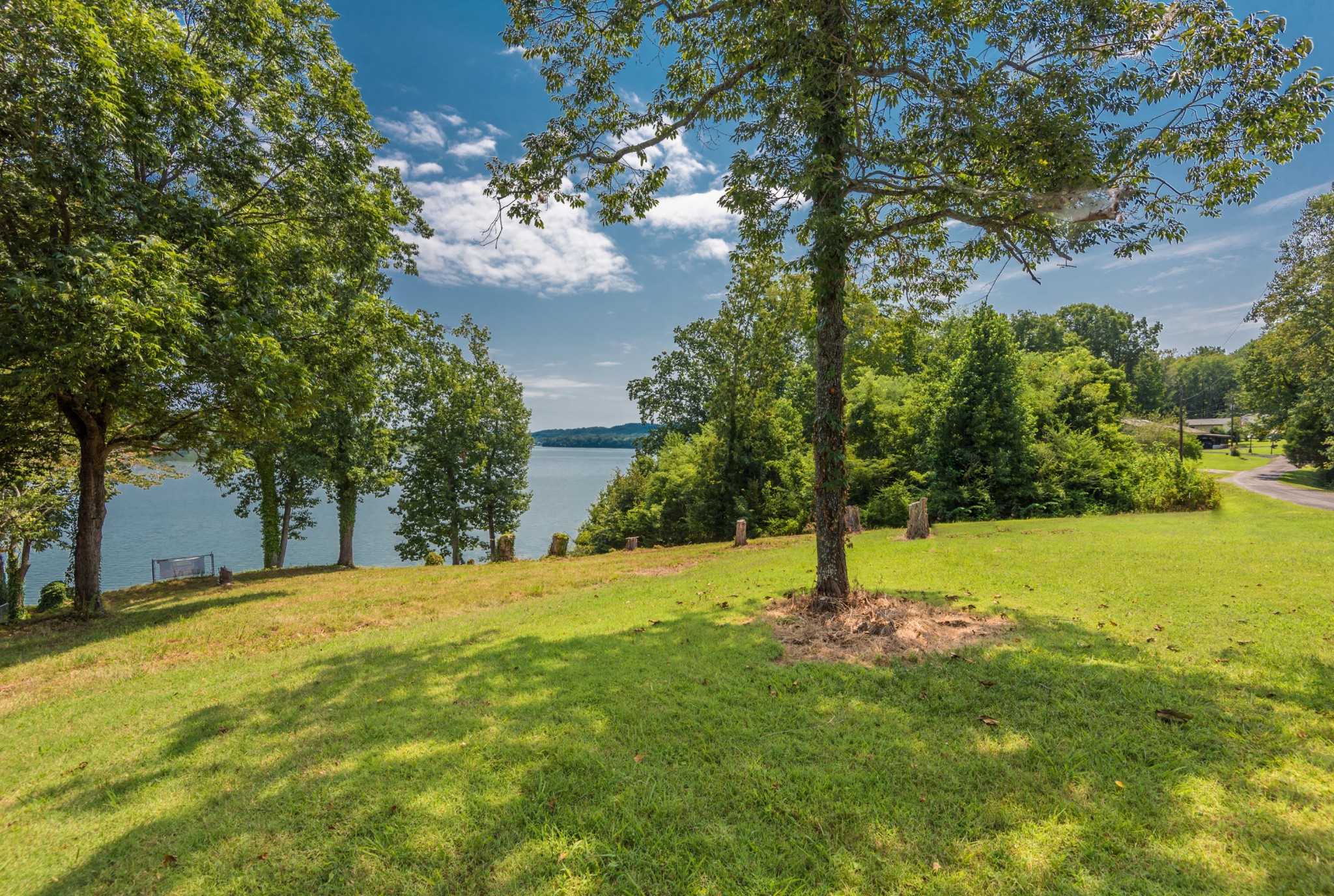364 Hilltop Road Spring City, TN 37381 - Photo 1 of 18 a swimming pool with an outdoor space and seating area