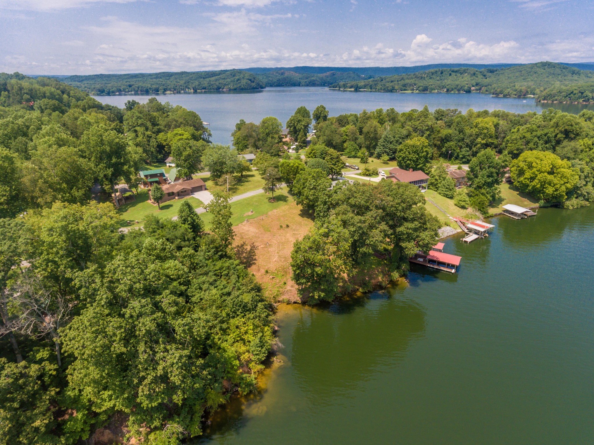 364 Hilltop Road Spring City, TN 37381 - Photo 13 of 18 a view of a lake with outdoor space