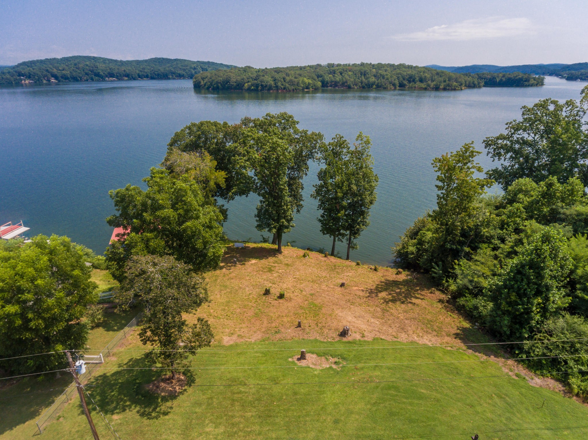 364 Hilltop Road Spring City, TN 37381 - Photo 6 of 18 a view of a lake with a mountain in the background