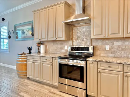 a white refrigerator freezer sitting inside of a kitchen