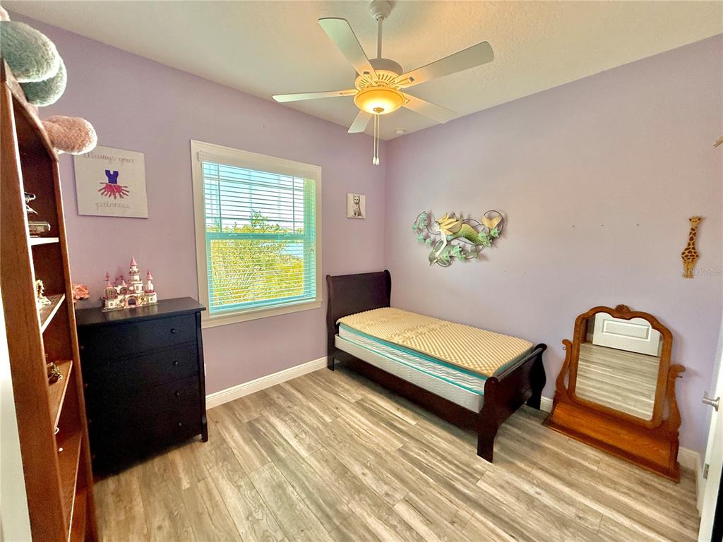2569 Palm Avenue Flagler Beach, FL 32136 - Photo 54 of 69 a bedroom with a bed and a window