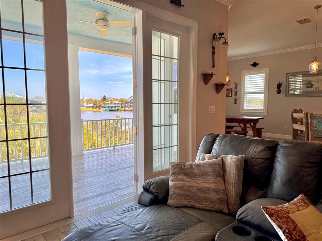 2569 Palm Avenue Flagler Beach, FL 32136 - Photo 8 of 69 a living room with furniture and a window