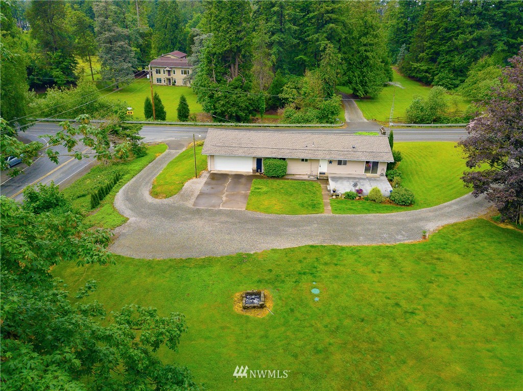 495 West Badger Road Lynden, WA 98264 - Photo 2 of 28 a view of green field with plants