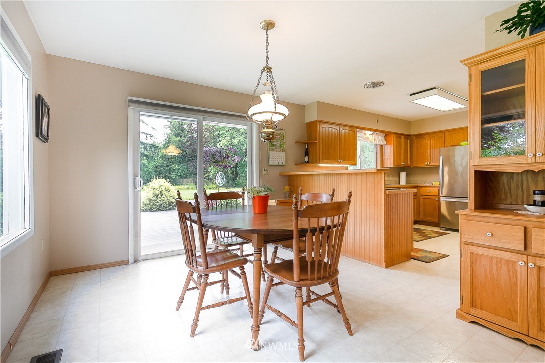 495 West Badger Road Lynden, WA 98264 - Photo 11 of 28 a view of a dining room with furniture window and outside view
