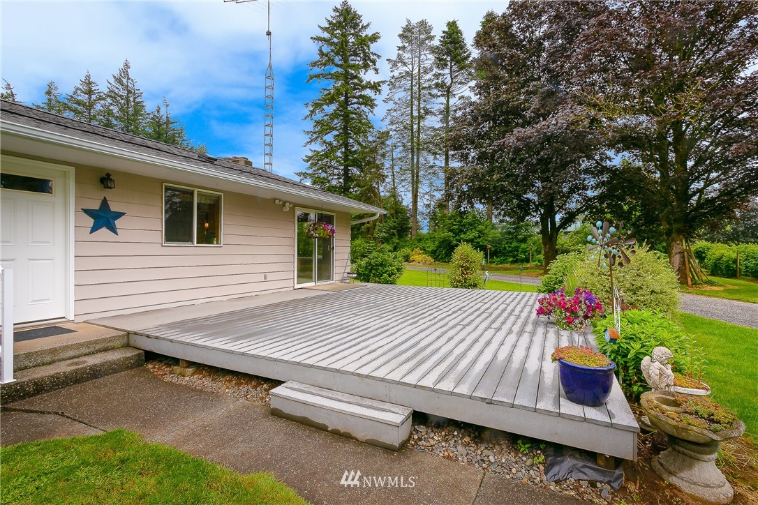 495 West Badger Road Lynden, WA 98264 - Photo 12 of 28 a view of a backyard with sitting area