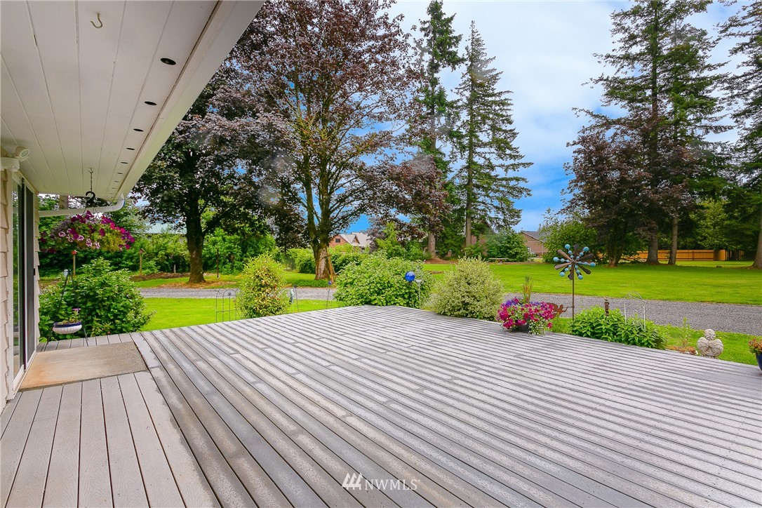 495 West Badger Road Lynden, WA 98264 - Photo 24 of 28 a view of a house with a yard