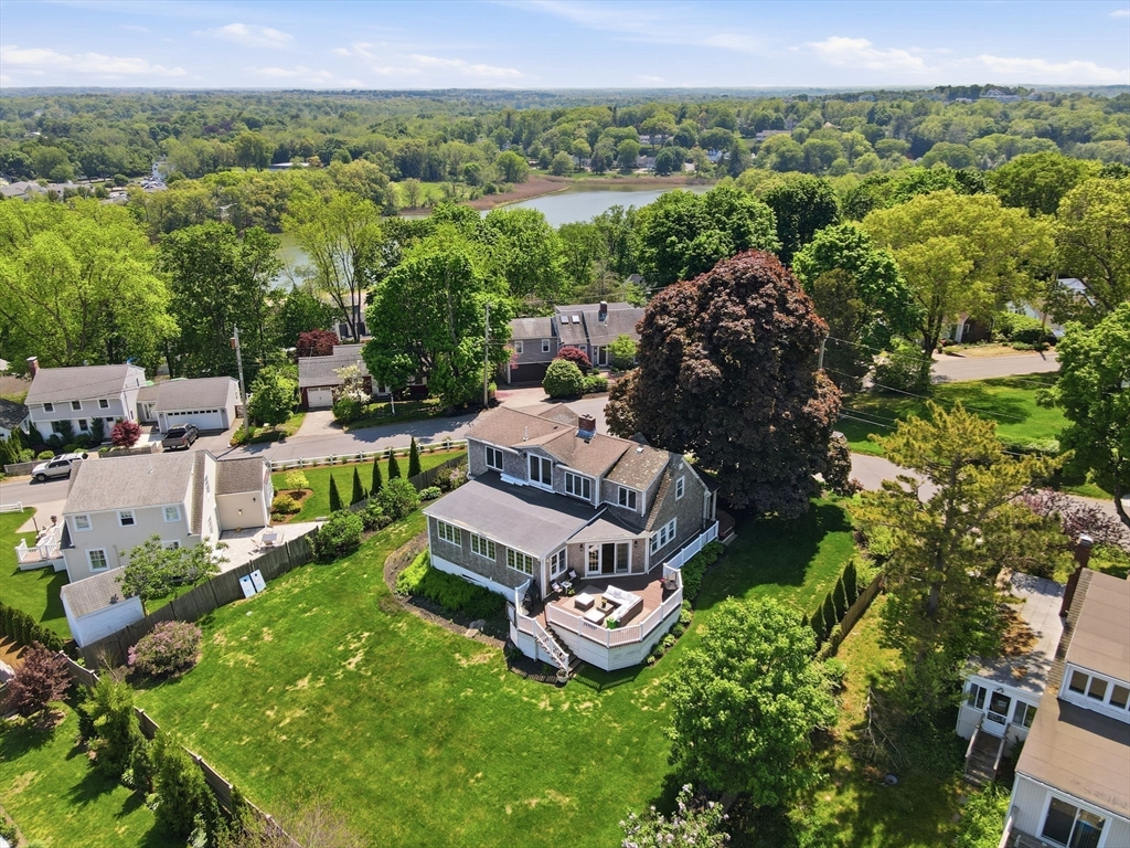 3 Talbot Road Hingham, MA 02043 - Photo 2 of 34 an aerial view of a house with a garden and lake view