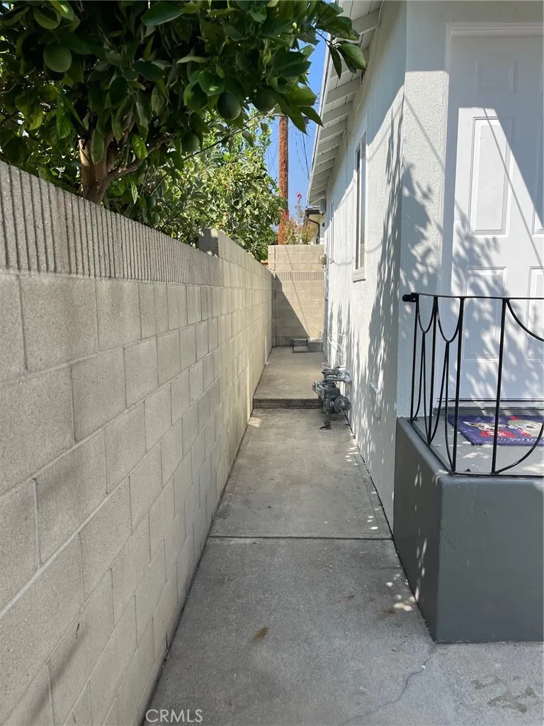 515 Alexander Street Glendale, CA 91203 - Photo 4 of 15 a view of a pathway of a house with a bench
