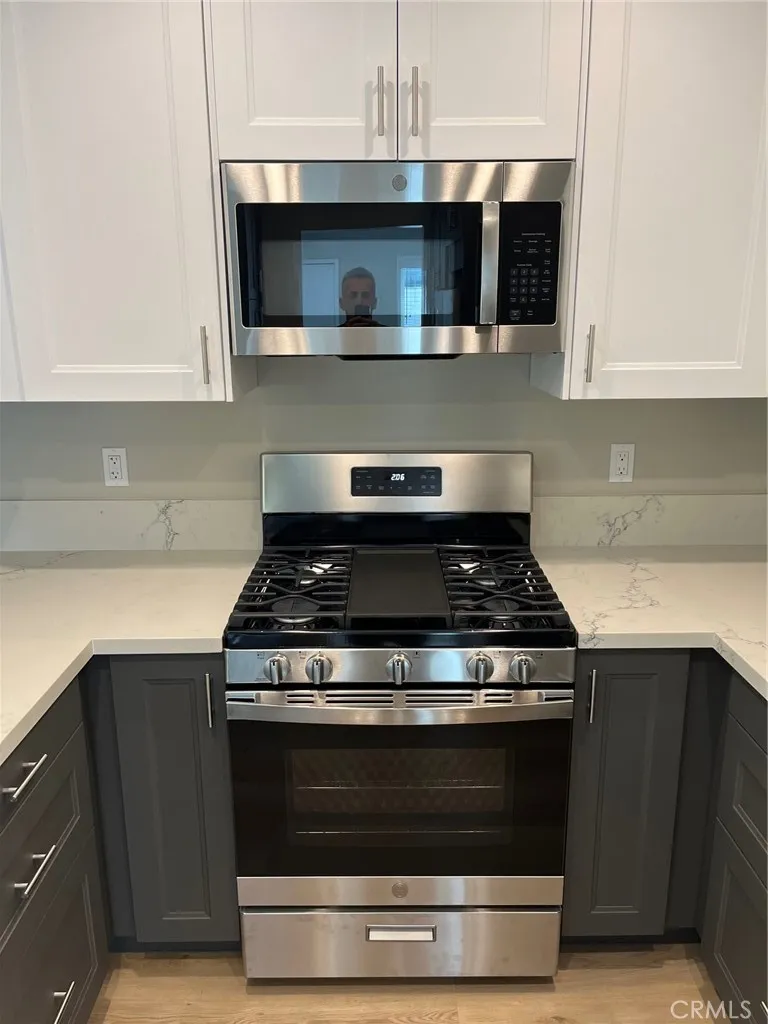 515 Alexander Street Glendale, CA 91203 - Photo 10 of 15 a stove top oven sitting inside of a kitchen