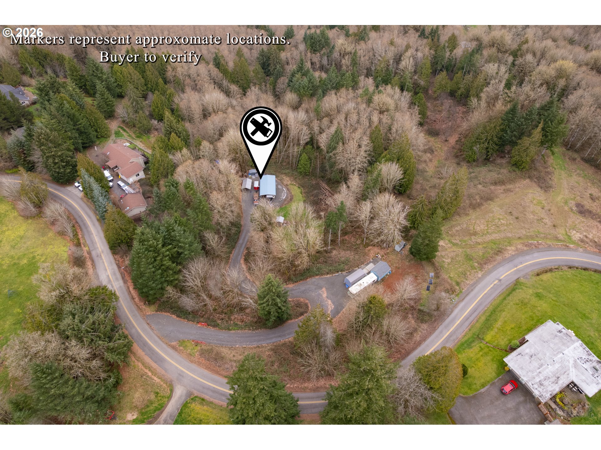 0 Debast Road Rainier, OR 97048 - Photo 6 of 12 a view of a wooden house with a yard and trees